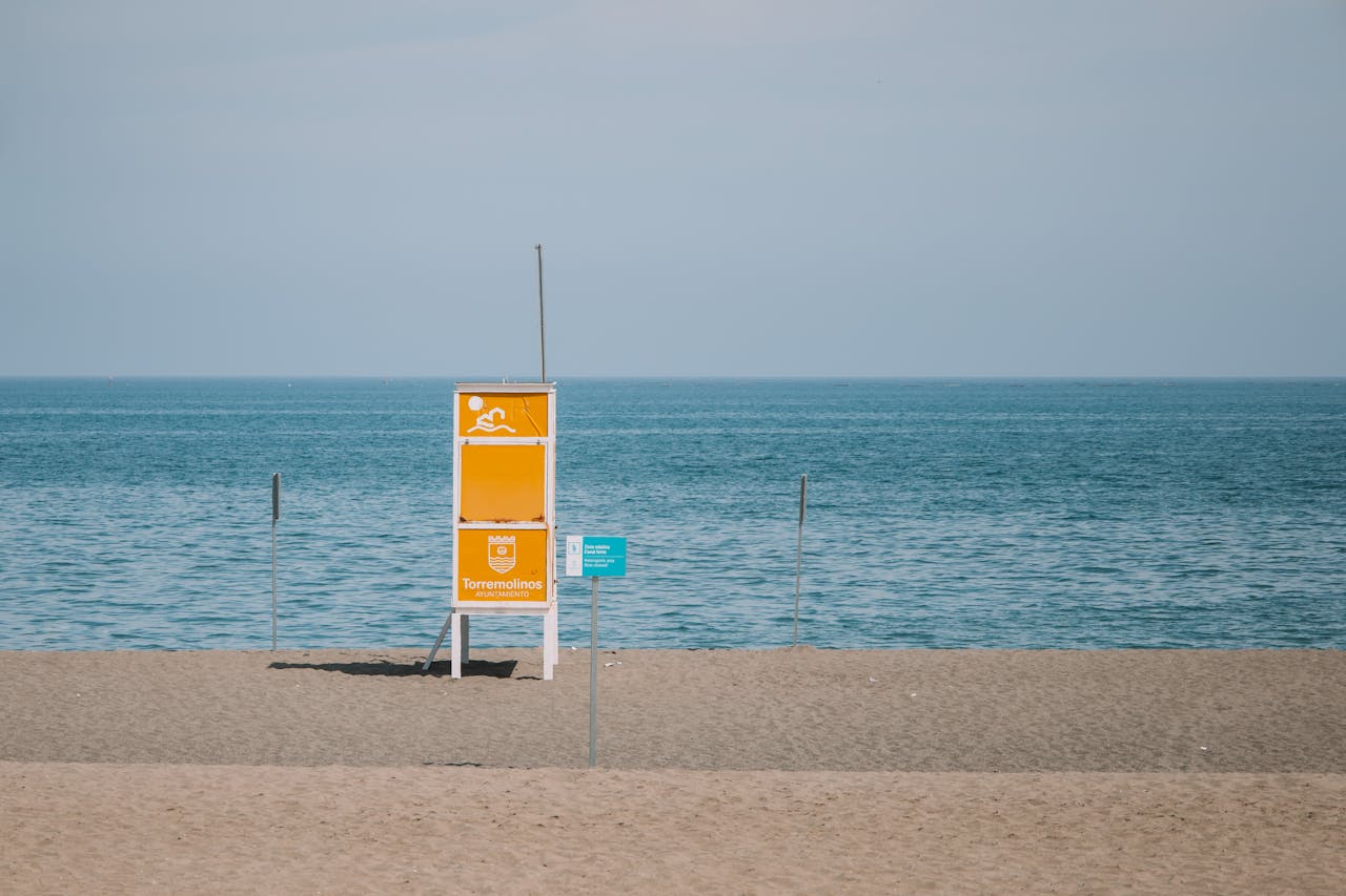 A minimalist photo of a lifeguard tower on Torremolinos beach in Málaga, Spain.